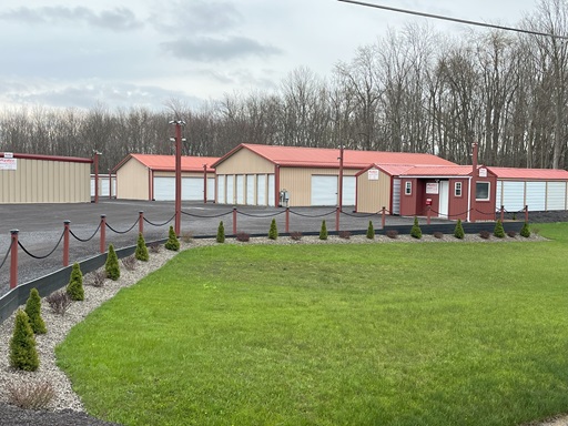 Ryder Storage buildings behind the landscaped front fence